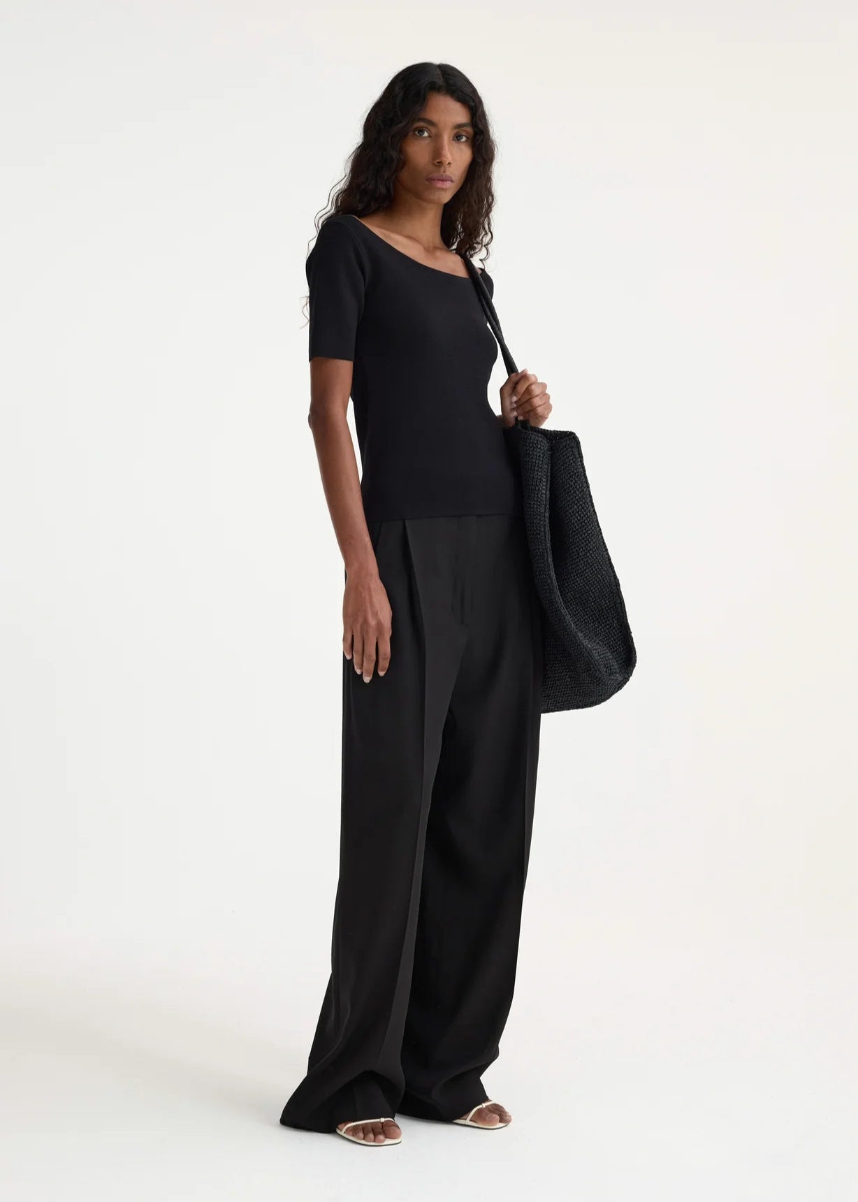 RÓHE MID-WAISTED PLEATED TROUSERS - BLACK