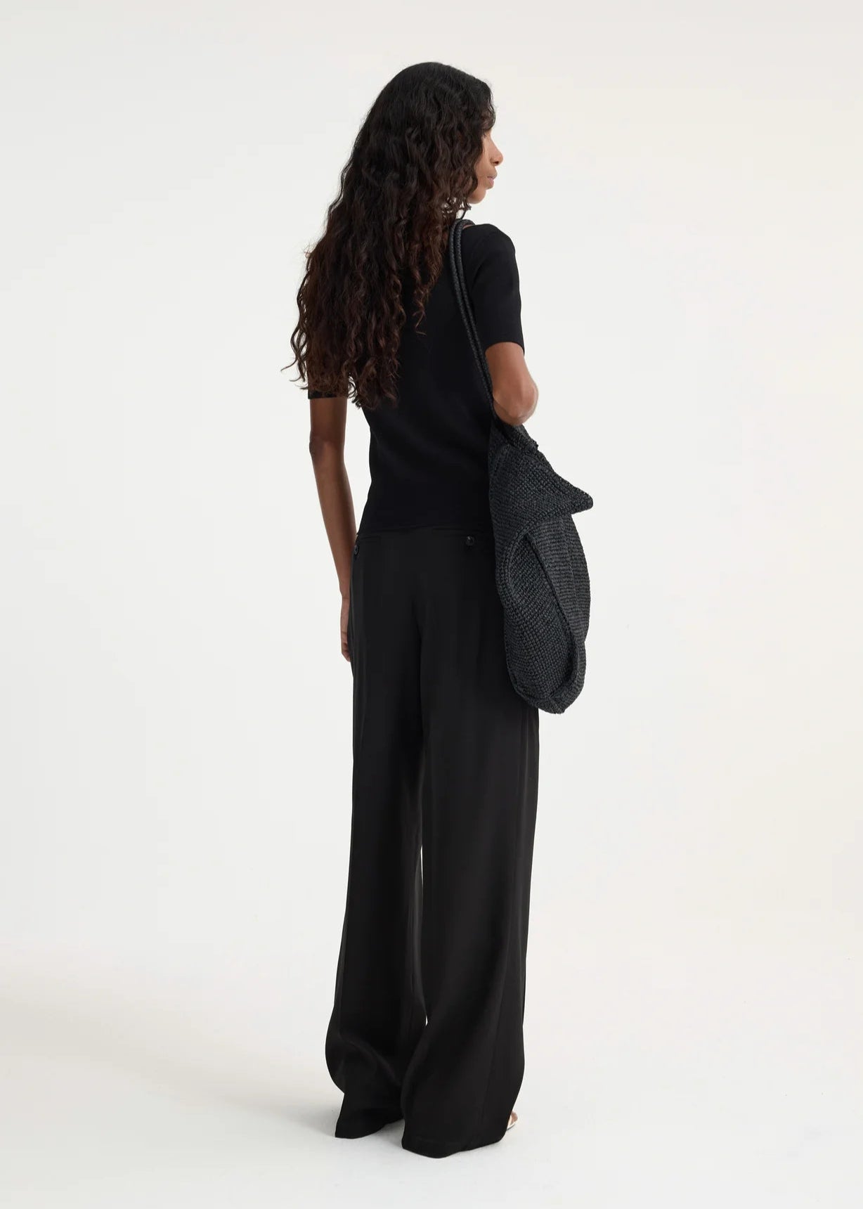 RÓHE MID-WAISTED PLEATED TROUSERS - BLACK